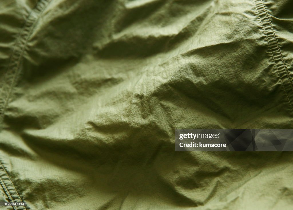 Khaki green color nylon cloth wrinkles