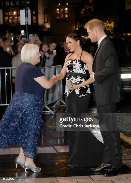 The Duke and Duchess of Sussex are greeted as they arrive at The Royal Variety Performance 2018 at London Palladium on November 19, 2018 in London,...