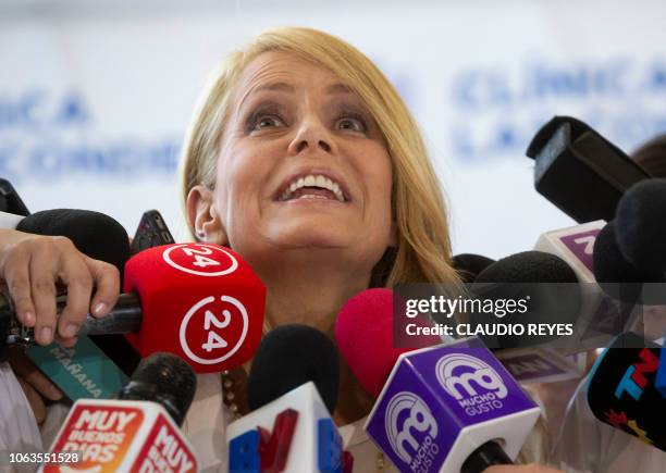 Chilean former Miss Universe and ex-wife of former Argentine president Carlos Menem, Cecilia Bolocco delivers a press conference at Las Condes clinic...