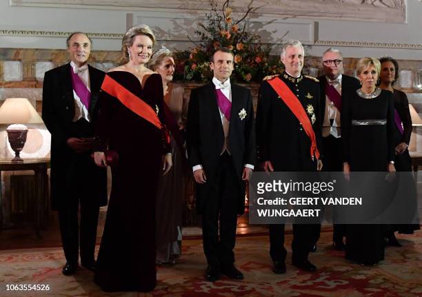 Belgium's royal couple Philippe of Belgium and Mathilde of Belgium , French President Emmanuel Macron and his wife Brigitte Macron pose for...