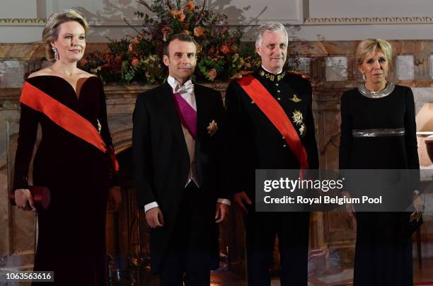 Queen Mathilde, Princess Astrid, President of France Emmanuel Macron, King Philip of Belgium, Prince Laurent and First Lady of France Brigitte pose...