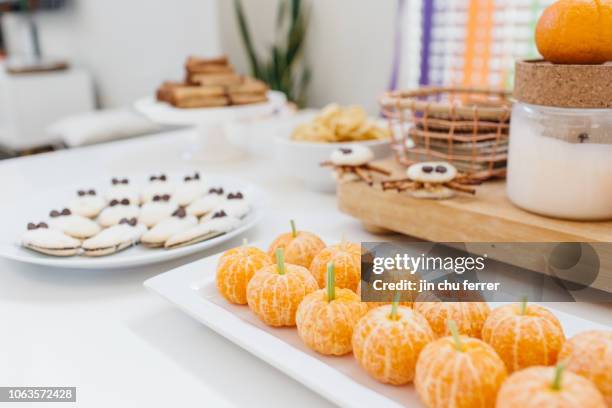 mini "pumpkin" oranges - halloween food stock pictures, royalty-free photos & images