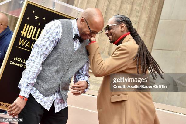 Warren G and Snoop Dogg attend the ceremony honoring Snoop Dogg with star on the Hollywood Walk of Fame on November 19, 2018 in Hollywood, California.