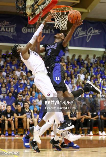 Cam Reddish of the Duke Blue Devils is fouled by Jalen McDaniels of the San Diego State Aztecs as he shoots during the second half of the game at...