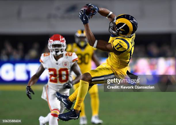 Robert Woods of the Los Angeles Rams completes a pass to set up the second touchdown against the Kansas City Chiefs in the first quarter of the game...