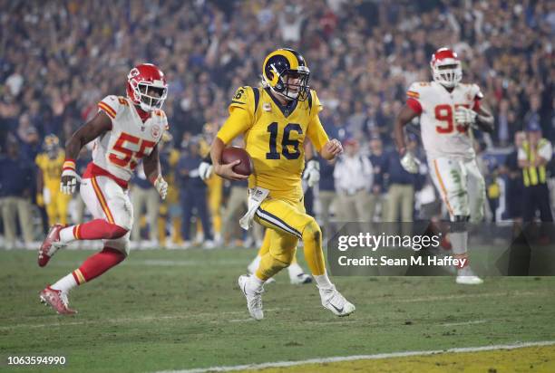 Quarterback Jared Goff of the Los Angeles Rams runs in for a touchdown on a seven yard rush during the third quarter of the game against the Kansas...