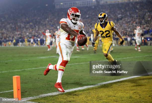 Chris Conley of the Kansas City Chiefs scores a touchdown during the fourth quarter of the game against the Los Angeles Rams at Los Angeles Memorial...