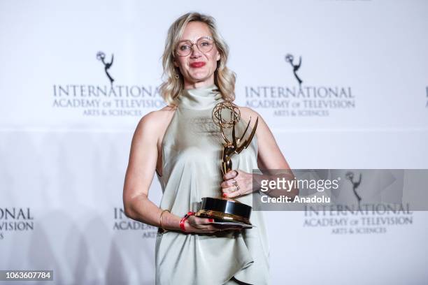 German actress Anna Schudt gives a pose with her award during the 46th International Emmy Awards at New York Hilton on November 19, 2018 in New York...