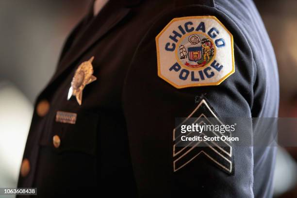 Chicago police officers attend a graduation and promotion ceremony at Navy Pier on November 19, 2018 in Chicago, Illinois. More than 350 officers...