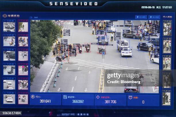 Screen shows a demonstration of SenseTime Group Ltd.'s SenseVideo pedestrian and vehicle recognition system at the company's showroom in Beijing,...