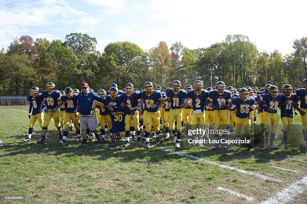 Colonia High coach Ben LaSala with team before game vs South... News