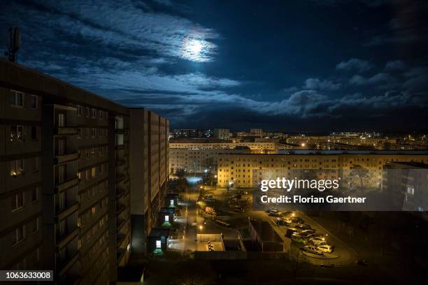 An industrialized apartment block is pictured during moon light on November 19, 2018 in Stendal, Germany.