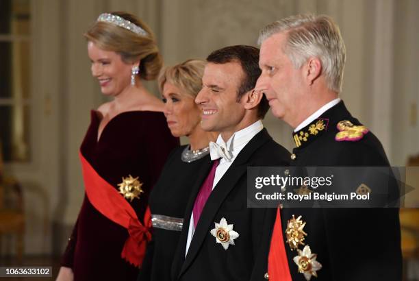 Queen Mathilde, President of France Emmanuel Macron, King Philip of Belgium and First Lady of France Brigitte pose for the official photo prior to...