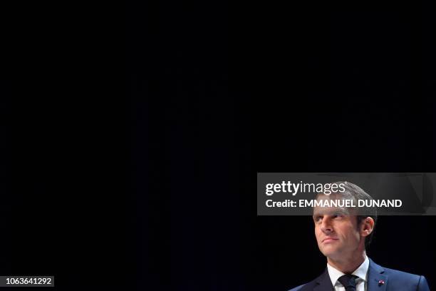 French President Emmanuel Macron looks on during his visit at the University of Louvain on November 20 in Louvain-la-Neuve, during a two-day state...