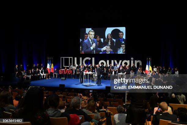 French President Emmanuel Macron gives a speech during his visit at the University of Louvain on November 20 in Louvain-la-Neuve, during a two-day...