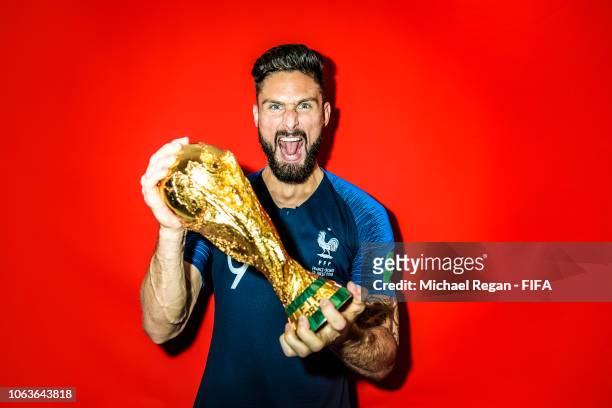 Olivier Giroud of France poses with the Champions World Cup trophy after the 2018 FIFA World Cup Russia Final between France and Croatia at Luzhniki...