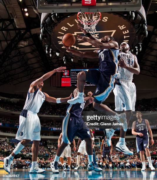 Tony Allen of the Memphis Grizzlies goes up and under against Brendan Haywood of the Dallas Mavericks during a game on October 29, 2010 at the...