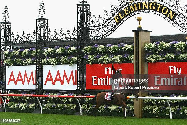 Hugh Bowman riding Lion Tamer crosses the line to win race Six AAMI Victoria Derby during Victoria Derby Day at Flemington Racecourse on October 30,...