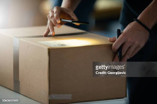 shipping company - send parcel stock pictures, royalty-free photos & images