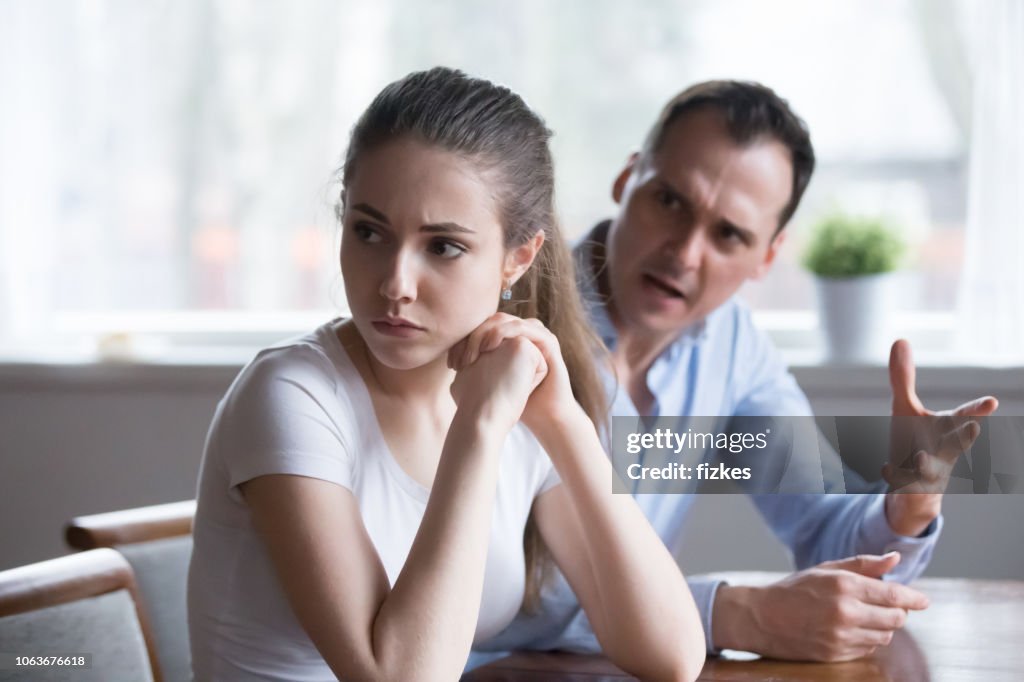 Mad man screaming or lecturing offended young lover