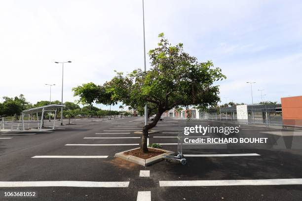 Photo shows the empty parking lot of a supermarket on the fourth day of protest of the so-called "yellow vest" movement against high fuel prices, in...