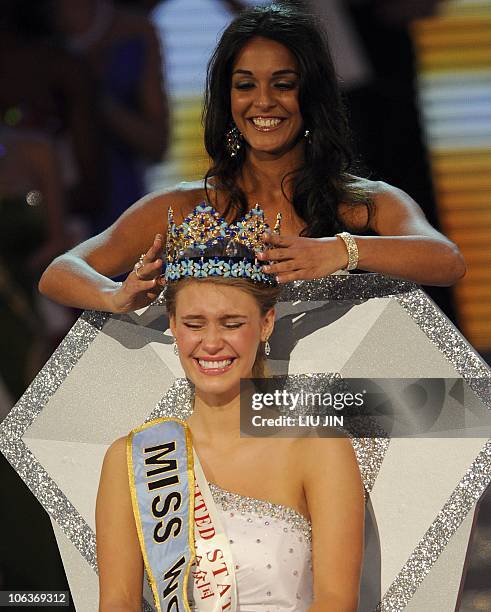 Alexandria Mills of the US is crowned as the 2010 Miss World by 2009 Miss World Kaiane Aldorino from Gibraltar during the Miss World 2010 Beauty...