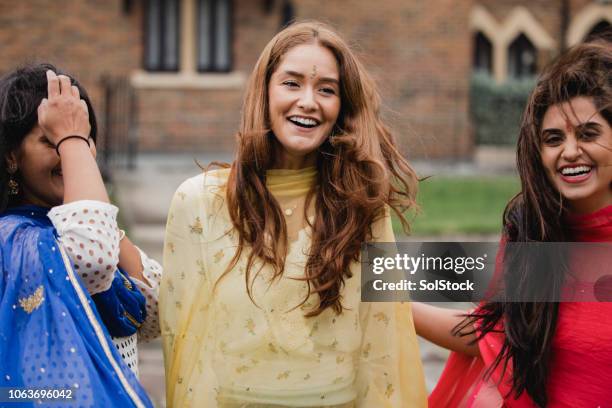 three woman is sari's - sari stock pictures, royalty-free photos & images