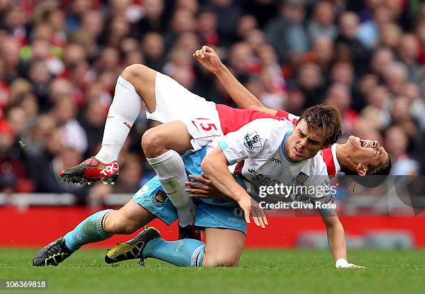 Scott Parker of West Ham tackles Neves Denilson of Arsenal during the Barclays Premier League match between Arsenal and West Ham United at Emirates...