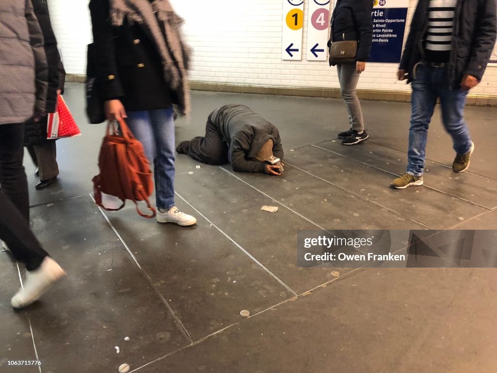 Homeless Man Begging For Money In The Paris Subway Chatelet Station ...