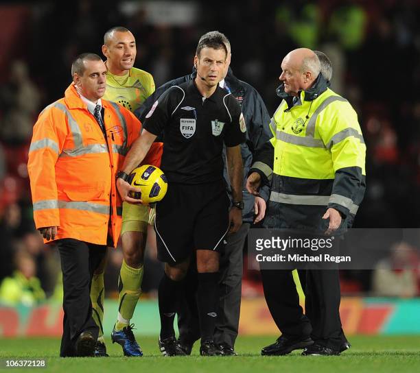 Heurello Gomez of Tottenham argues with referee Mark Clattenburg after the Barclays Premier League match between Manchester United and Tottenham...