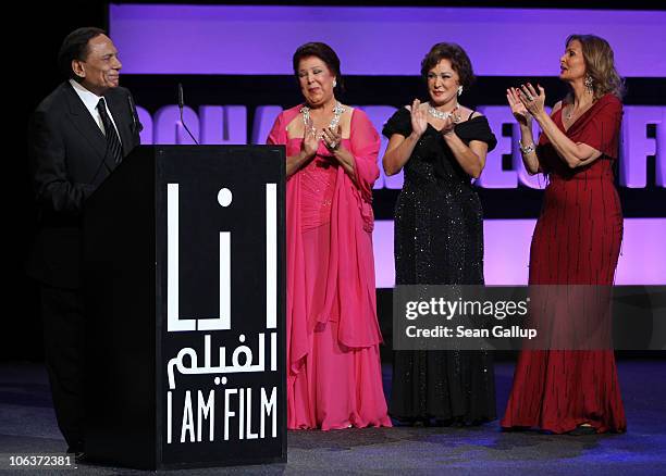 Adel Imam accepts the Lifetime Achievement Award with actresses Raja Al Jiddawi, Lubluba and Yosra onstage at the Awards Show and Closing Night Red...