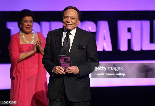 Actress Raja Al Jiddawi and Adel Imam who accepts the Lifetime Achievement Award onstage at the Awards Show and Closing Night Red Carpet and...