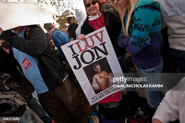 People gather on the National Mall in Washington, DC, on October 30, 2010 for television satirists Jon Stewart's and Stephen Colbert's Rally to...