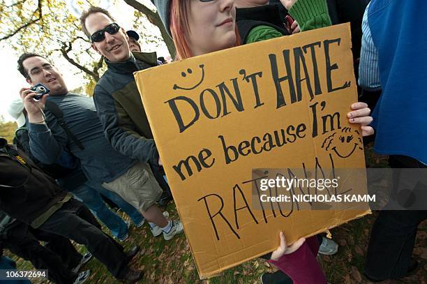 People gather on the National Mall in Washington, DC, on October 30, 2010 for television satirists Jon Stewart's and Stephen Colbert's Rally to...