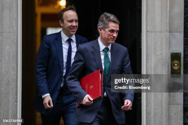 Gavin Williamson, U.K. Defence secretary, right, and Matt Hancock, U.K. Health secretary, leave after the weekly meeting of cabinet ministers at...