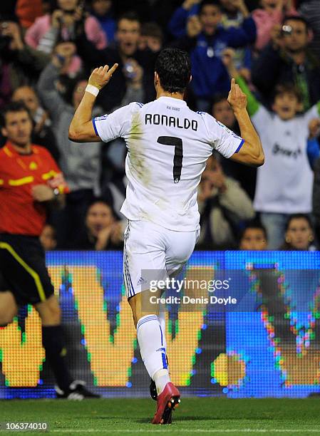 Cristiano Ronaldo of Real Madrid celebrates after scoring his team's third goal during the La Liga match between Hercules FC and Real Madrid at...
