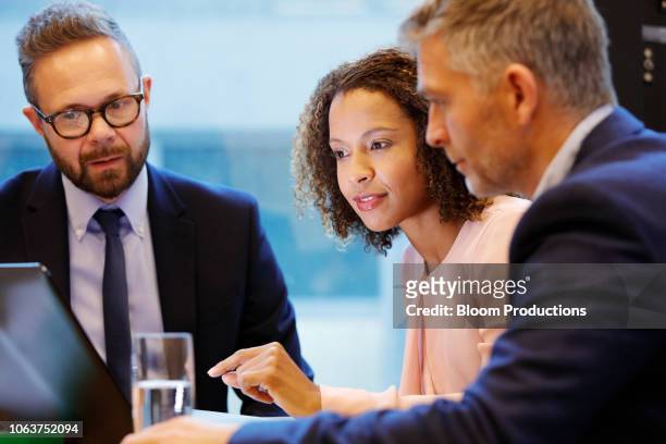 financial advisior having a meeting with couple - bank manager bildbanksfoton och bilder