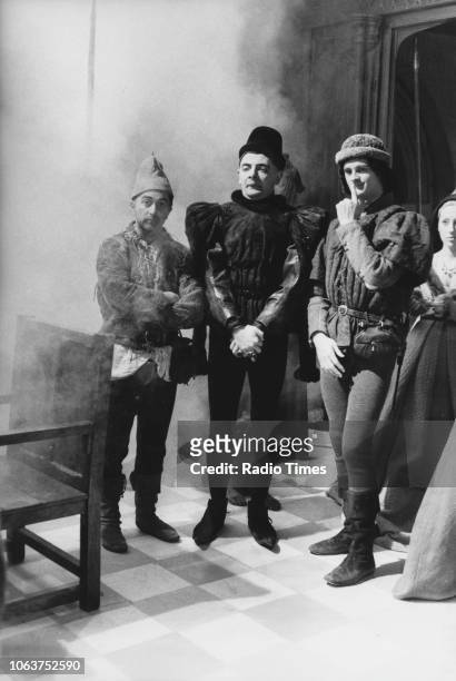 Actors Tony Robinson, Rowan Atkinson and Tim McInnery in costume on the set of the television show 'The Black Adder', March 6th 1983.