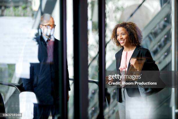 business people on the move - farewell colleague stock pictures, royalty-free photos & images