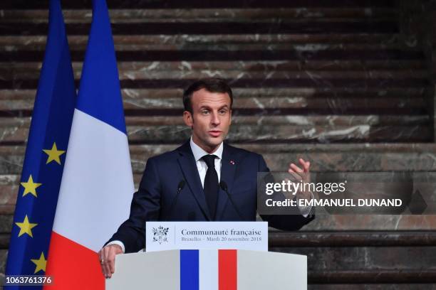 French President Emmanuel Macron delivers a speech during a French-speaking community reception at the "BOZAR" Centre for Fine Arts in Brussels, on...