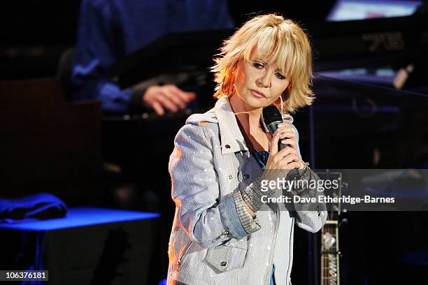 Singer Lulu sings to Neil Diamond on stage during the closing night of the BBC Radio 2 Electric Proms 2010 at The Roundhouse on October 30, 2010 in...