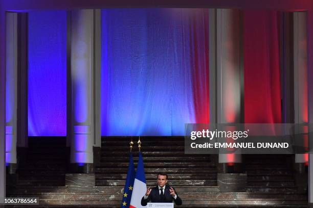 French President Emmanuel Macron delivers a speech during a French-speaking community reception at the "BOZAR" Centre for Fine Arts in Brussels, on...