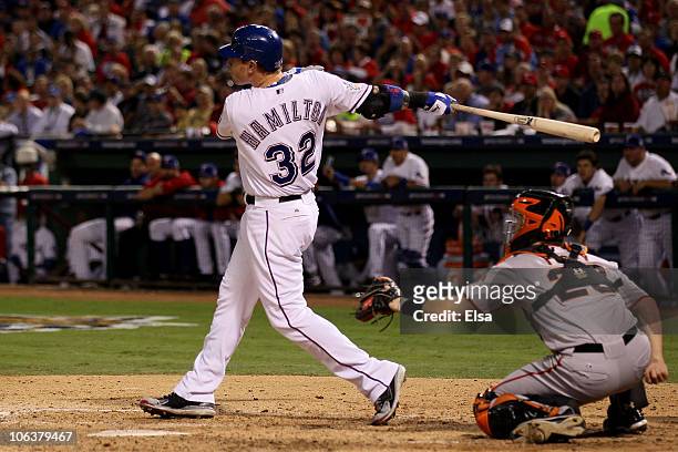 Josh Hamilton of the Texas Rangers hits a solo home run in the bottom of the fifth inning against the San Francisco Giants in Game Three of the 2010...