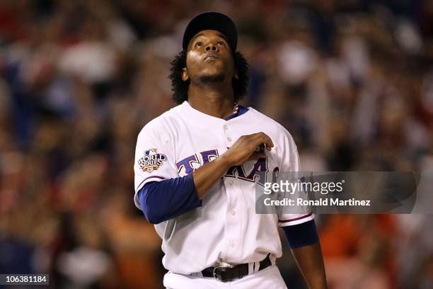 Neftali Feliz of the Texas Rangers reacts after he recorded the final out of their 4-2 win against the San Francisco Giants in Game Three of the 2010...