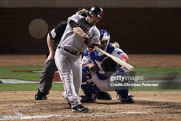 Andres Torres of the San Francisco Giants hits a solo home run in the eighth inning against the Texas Rangers in Game Three of the 2010 MLB World...