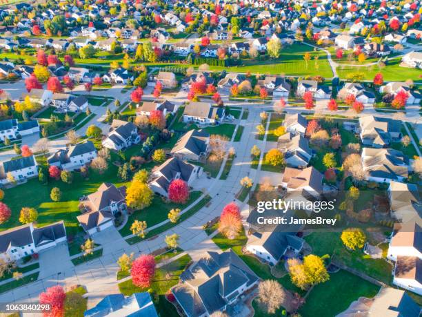 breathtaking aerial view of idyllic autumn neighborhoods. - wisconsin house stock pictures, royalty-free photos & images