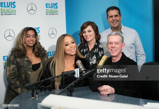 Mariah Carey poses for a photo with Medha Gandhi, Danielle Monaro, Elvis Duran and Skeery Jones at "The Elvis Duran Z100 Morning Show" at Z100 Studio...