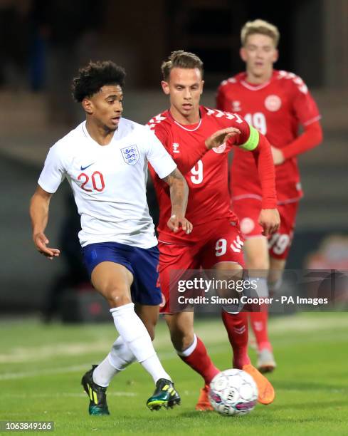 England U21's Reiss Nelson and Denmark U21's Marcus Ingvartsen battle for the ball during the international friendly match at the Blue Water Arena,...