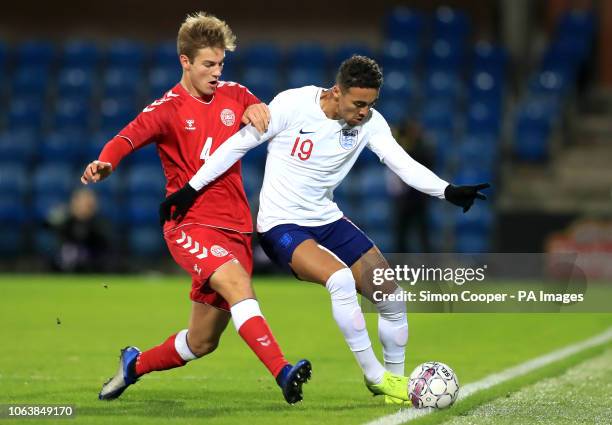 Denmark U21's Joachim Andersen and England U21's Dominic Calvert-Lewin battle for the ball during the international friendly match at the Blue Water...