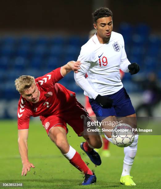 Denmark U21's Rasmus Nissen and England U21's Dominic Calvert-Lewin battle for the ball during the international friendly match at the Blue Water...